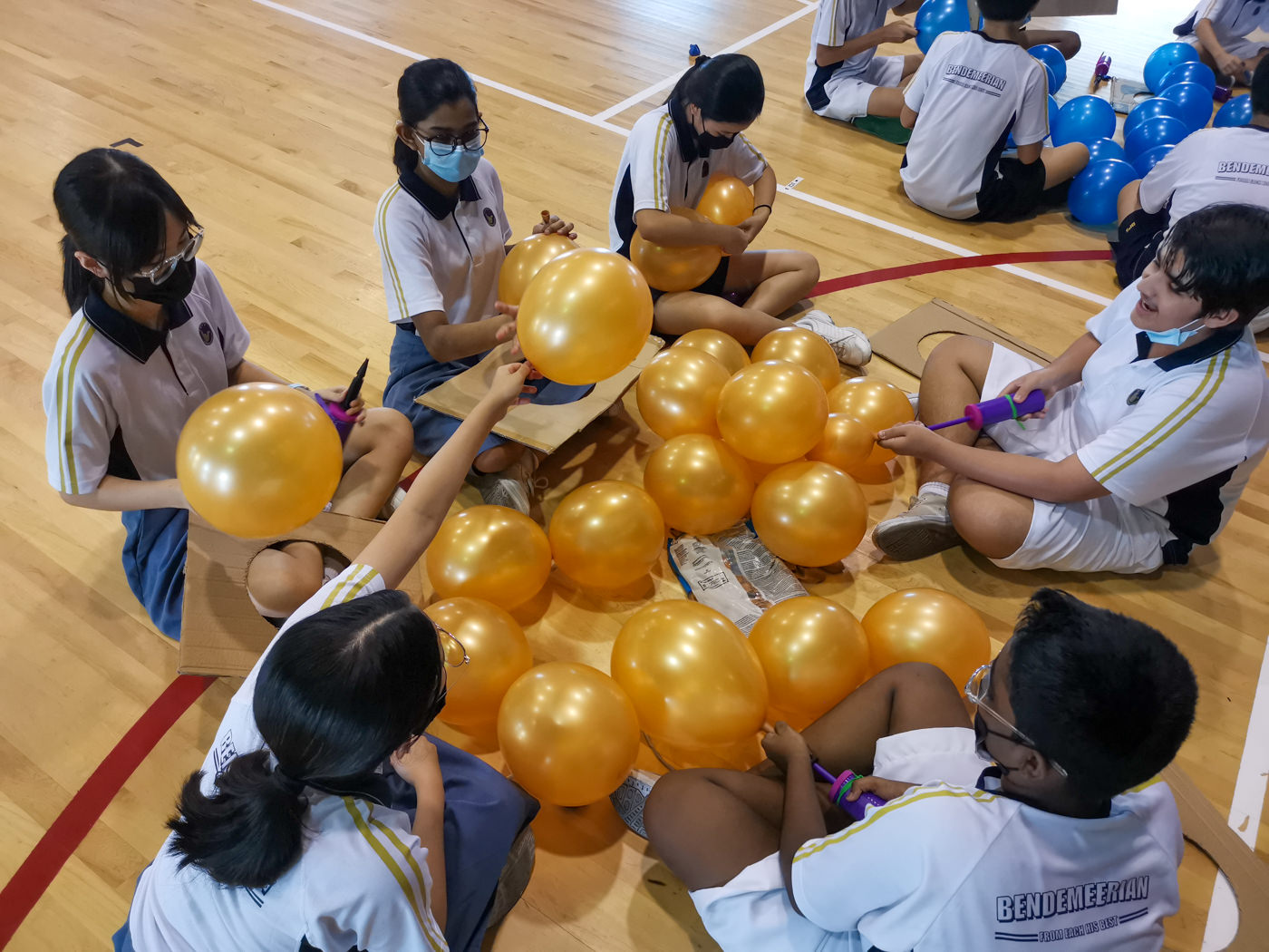 Preparing balloons for Speech Day
